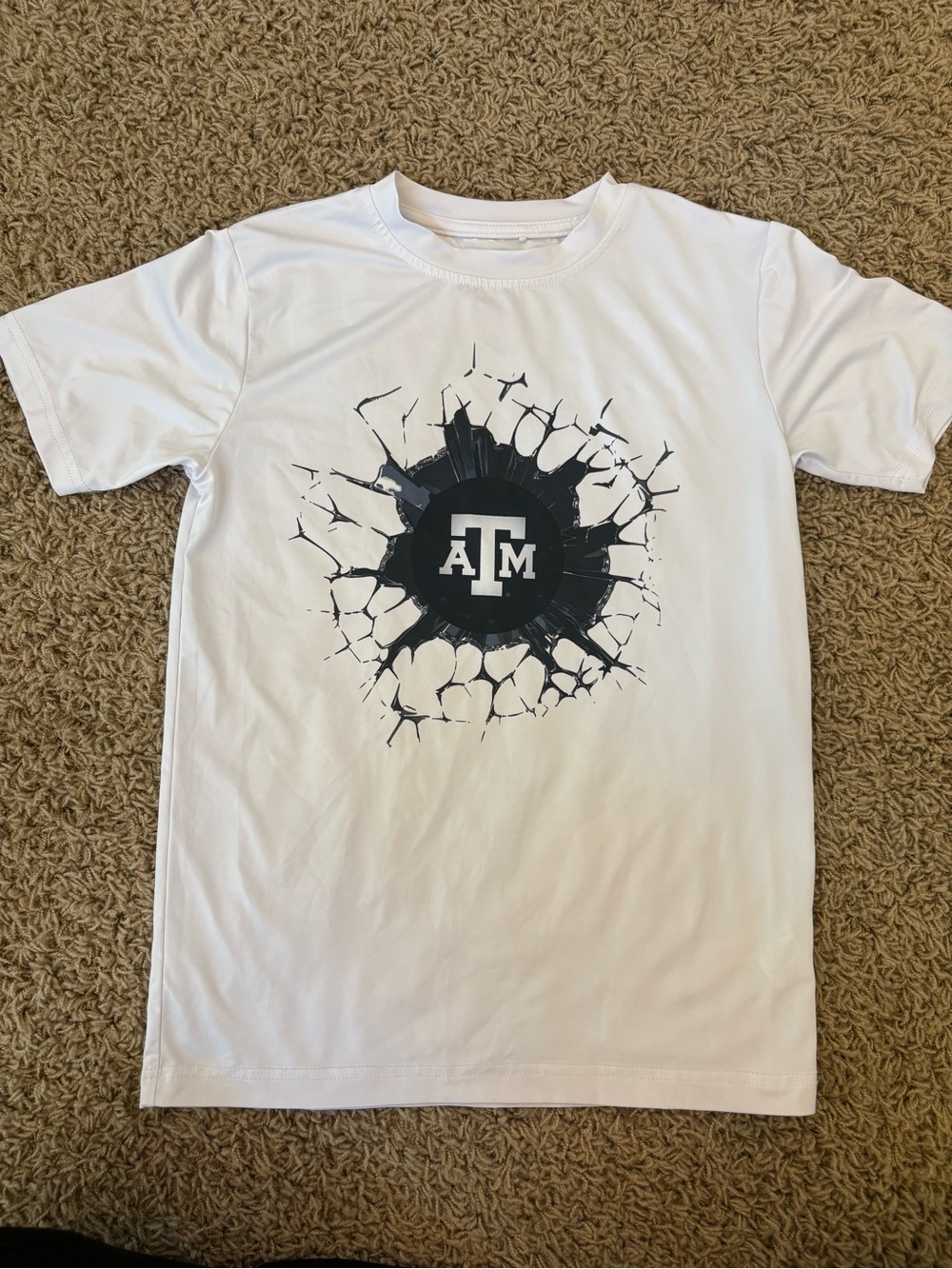 Boy’s Garb A&M White Dryfit Tee with Black Cracked-Circle Logo, Size S